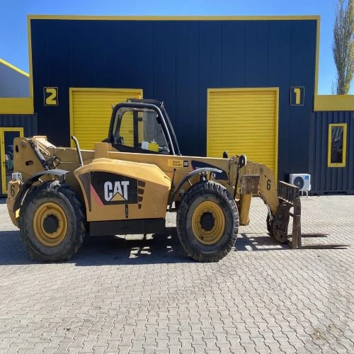 Телескопичен товарач Caterpillar TH514