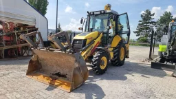Комбиниран багер New Holland B100 2011 image 1