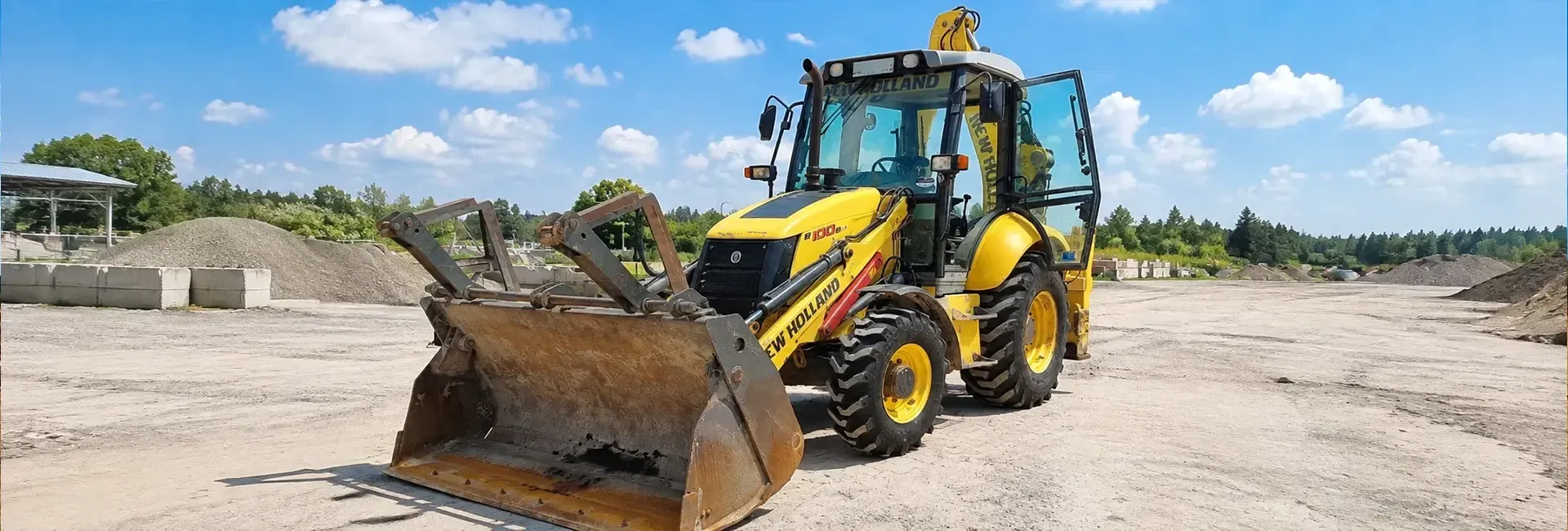 Комбиниран багер New Holland B100